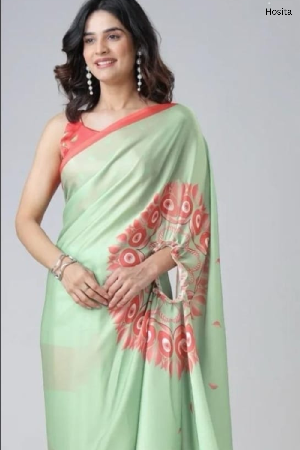 Vastrikaara Parrot Green with Orange Print Freehand Pattern Saree