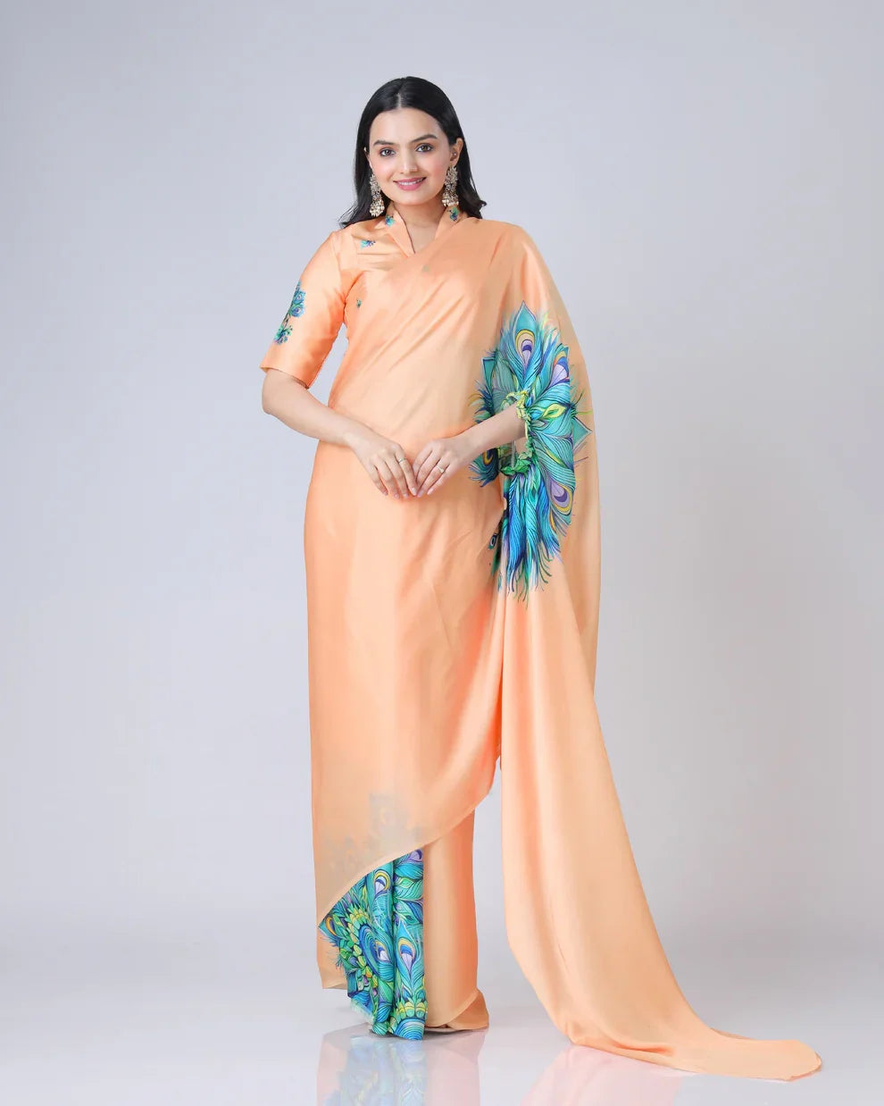 Vastrikaara Light Orange Peacock Feather Freehand Designer Saree